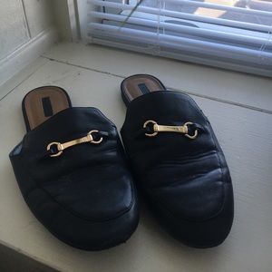 Black and gold mules